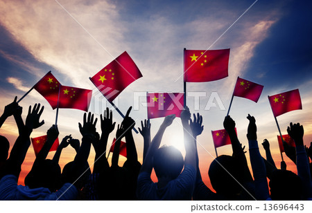 Silhouettes of People Holding the Flag of China Silhouettes of People Holding the Flag of China 13696443