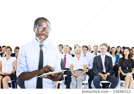 African Businessman Standing in Front of the Crowd 13696522