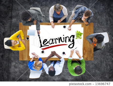 Multiethnic Group of People Discussing About Learning Multiethnic Group of People Discussing About Learning 13696747