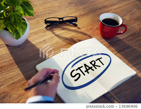 Businessman Writing the Word "Start" 13696906