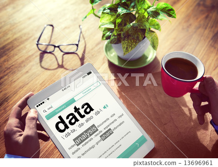 Man Reading the Definition of Data 13696961