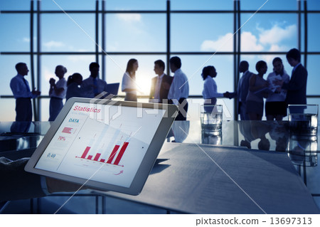 Silhouettes of Business People Working in an Office Building Silhouettes of Business People Working in an Office Building 13697313