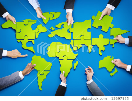 Group of Business People with Jigsaw Puzzle Forming in World Map Group of Business People with Jigsaw Puzzle Forming in World Map 13697535