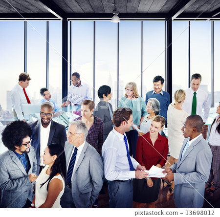 Multiethnic Group of Business People in the Office Multiethnic Group of Business People in the Office 13698012