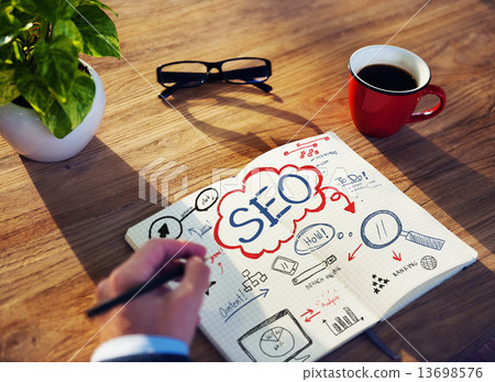 Businessman Sketching About SEO Concept Businessman Sketching About SEO Concept 13698576