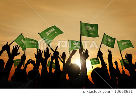 Silhouettes of People Holding Flag of Saudi Arabia Silhouettes of People Holding Flag of Saudi Arabia 13698651