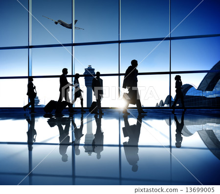Business People On Their Way To The Business Trip Walking In An 13699005