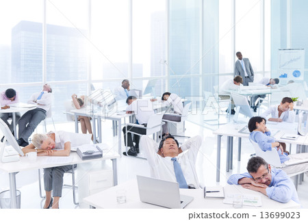 Group of Business People Sleeping in the Office 13699023