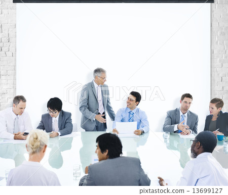 Multiethnic Group of People Meeting in the Office 13699127
