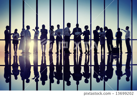 Silhouettes of Business People Working Together Silhouettes of Business People Working Together 13699202