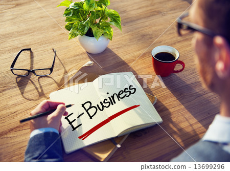 Businessman Writing the Word E-Business 13699296