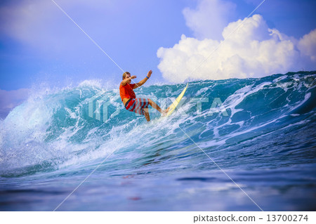 Surfer on Amazing Blue Wave 13700274