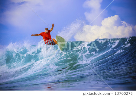 Surfer on Amazing Blue Wave 13700275