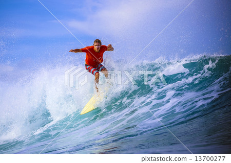 Surfer on Amazing Blue Wave 13700277