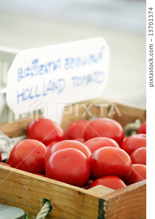 Tomato in wooden box Tomato in wooden box 13701374