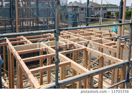 Wooden house construction site image 13703356