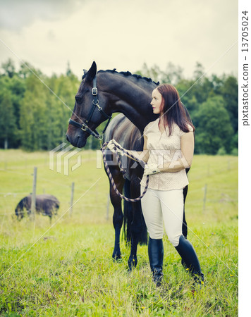 Woman and horse 13705024
