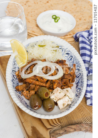 Gyros with Tzatziki Coleslaw olives and feta cheese Gyros with Tzatziki Coleslaw olives and feta cheese 13705487