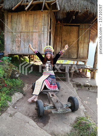 Traditionally dressed Mhong hill tribe woman Traditionally dressed Mhong hill tribe woman 13710197