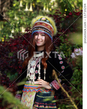 Traditionally dressed Mhong hill tribe woman in the garden 13710204