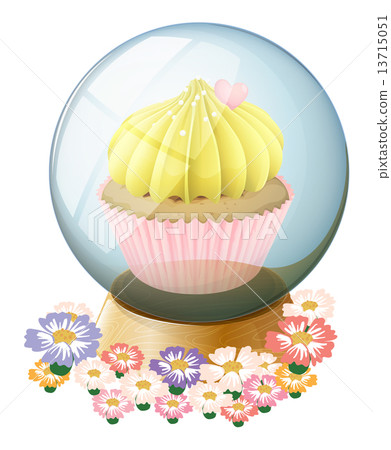 A clear crystal ball with a cupcake inside A clear crystal ball with a cupcake inside 13715051