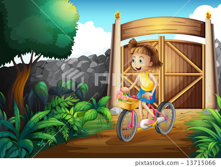 A child biking at the yard A child biking at the yard 13715066