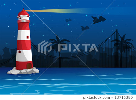 A bright lighthouse in the middle of the sea A bright lighthouse in the middle of the sea 13715390