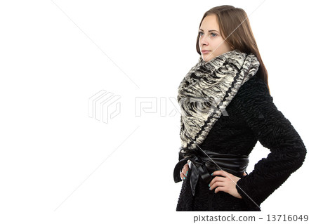 Image of the young serious woman in fur coat Image of the young serious woman in fur coat 13716049