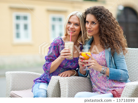 woman friends at cafe woman friends at cafe 13718899