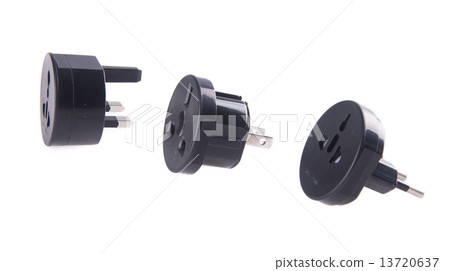 Travel plug adapter on a background 13720637