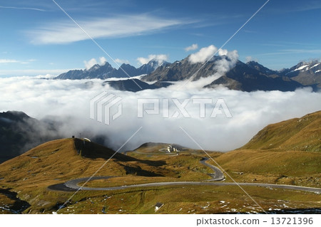 Hochalpenstrasse with fog 13721396