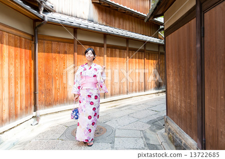 A woman in a yukata A woman in a yukata 13722685