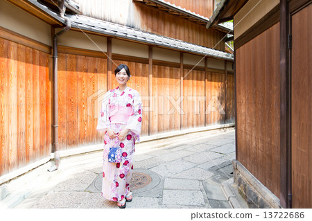 A woman in a yukata A woman in a yukata 13722686