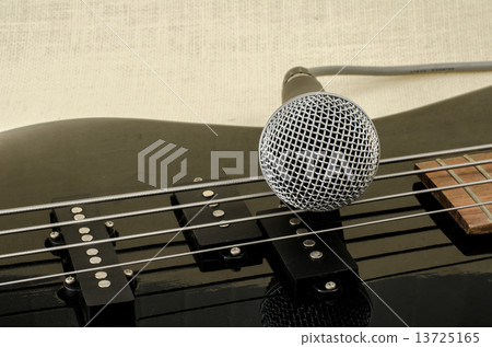 microphone on electric bass guitar microphone on electric bass guitar 13725165