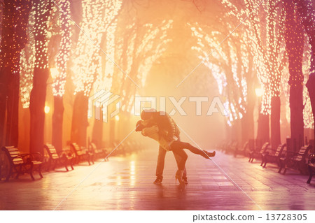 Couple kissing at night alley. Couple kissing at night alley. 13728305