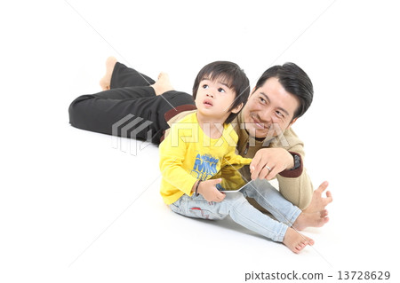 Father and Child playing with Tablet pc touch pad  13728629