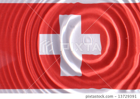Swiss flag under water with nice circles and ripples 13729391