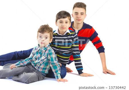 Shot studio with three boys brothers 13730442