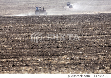 Tractor plowing Tractor plowing 13733400