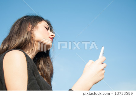 young beautiful girl on the phone young beautiful girl on the phone 13733599