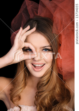 Young woman shows OK sign 13734035