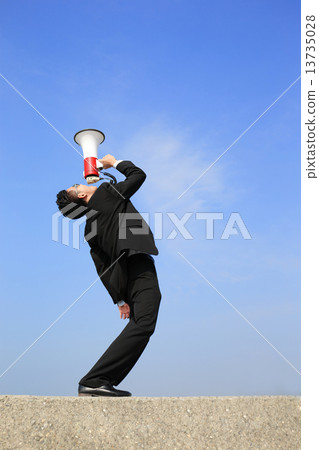 business man using megaphone business man using megaphone 13735028