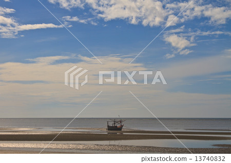 Fishing boat on the beach 13740832