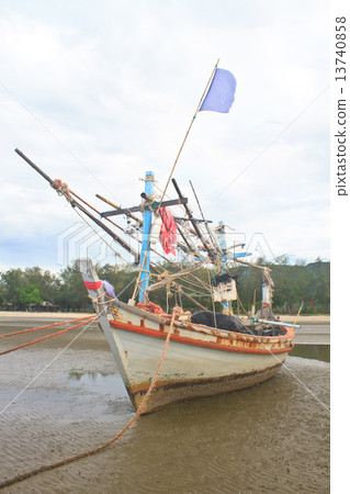 Fishing boat on the beach 13740858