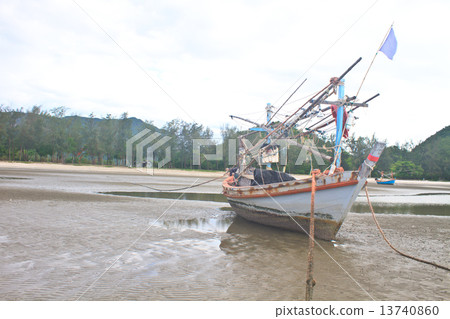 Fishing boat on the beach Fishing boat on the beach 13740860