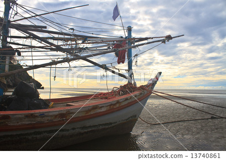 Fishing boat on the beach Fishing boat on the beach 13740861