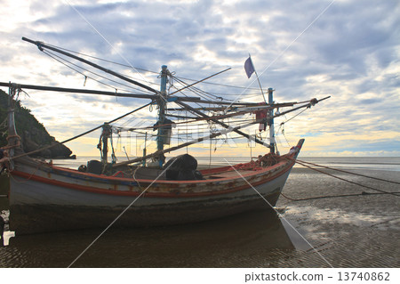 Fishing boat on the beach Fishing boat on the beach 13740862