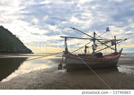 Fishing boat on the beach Fishing boat on the beach 13740863