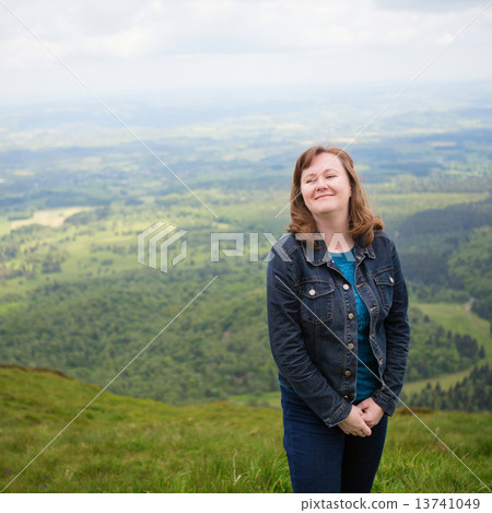 Girl in Volcano natural park in Auverge, France 13741049