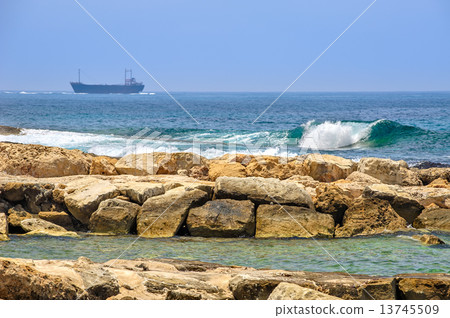 Cargo ships on horizon 13745509